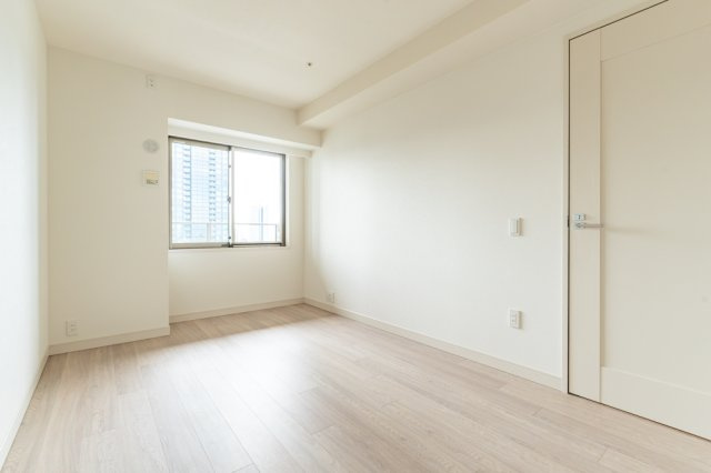 グランドメゾン新梅田タワー THE CLUB RESIDENCEの洋室