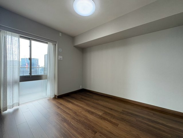 グランドメゾン新梅田タワー THE CLUB RESIDENCEの寝室|洋室