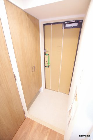 エスリード京橋セントラル　仲介手数料無料の玄関