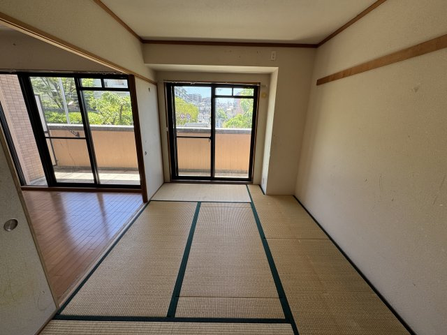 コムザ21北緑丘の寝室