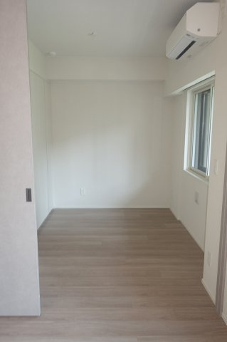 シーズンフラッツ町屋の寝室