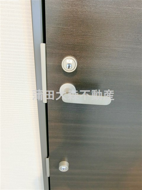 メルヴェーユ久が原の玄関