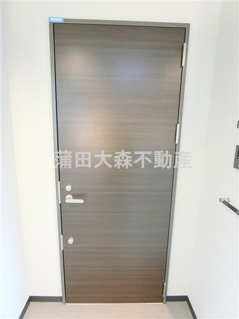 メルヴェーユ久が原の玄関