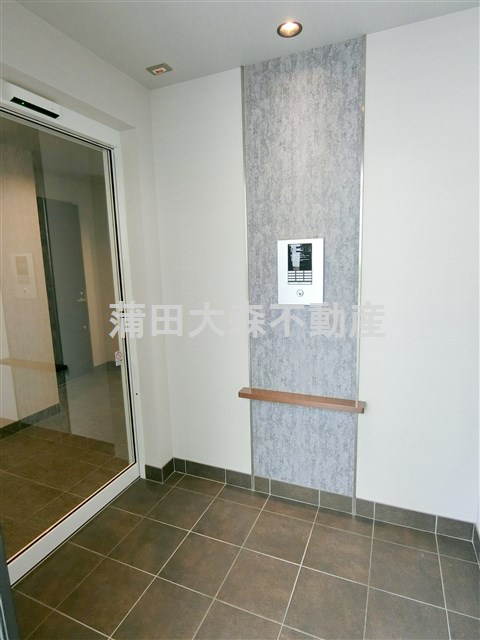 メルヴェーユ久が原のエントランス