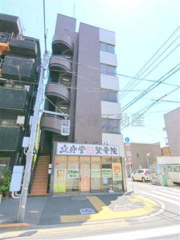 プラスワンビルの外観