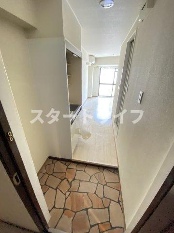 大阪市東淀川区小松２丁目の賃貸マンションの玄関