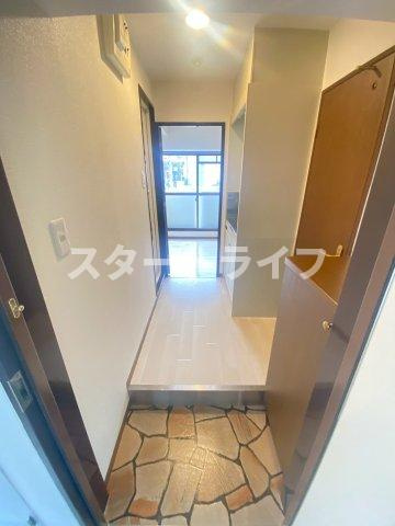 大阪市東淀川区豊新２丁目の賃貸マンションの玄関