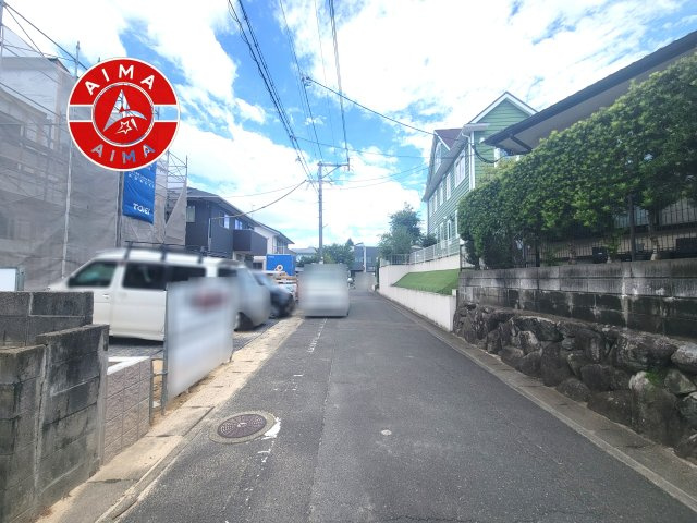福岡市南区鶴田4丁目第1-1棟（1号棟）の外観|前面道路含む現地の写真です。