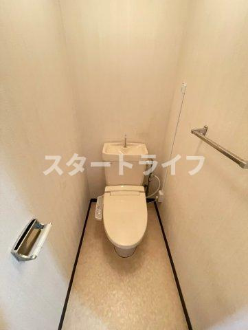 大阪市淀川区木川西４丁目の賃貸マンションのトイレ