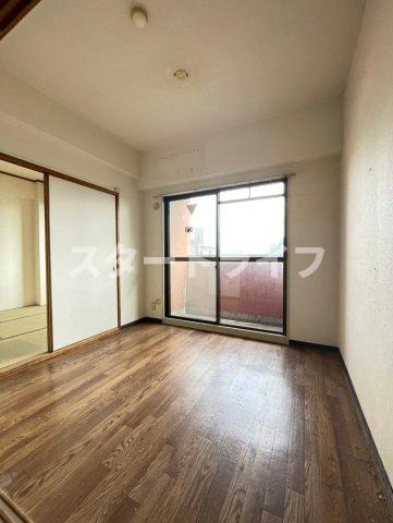 大阪市淀川区木川西４丁目の賃貸マンションの寝室