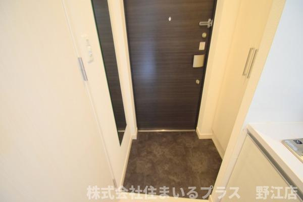 アドバンス大阪城北ルミウスの玄関