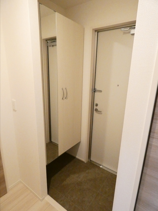 ブランネージュ東小串の玄関