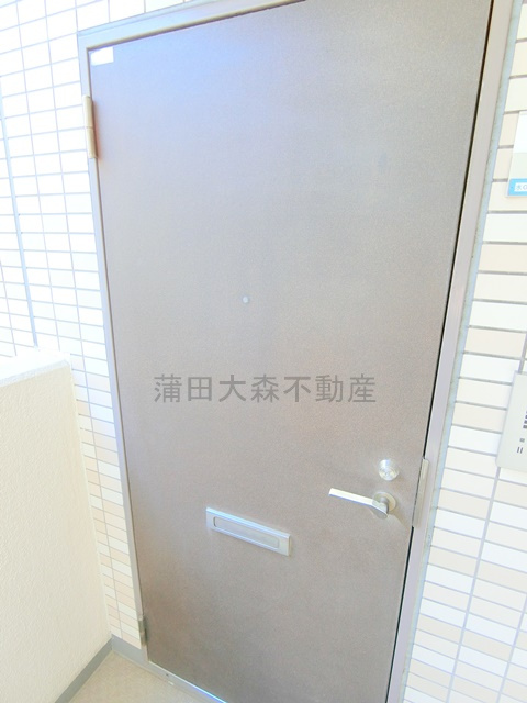 日神パレス平和島の玄関