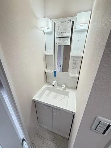 神戸市中央区割塚通４丁目の賃貸マンションの洗面所