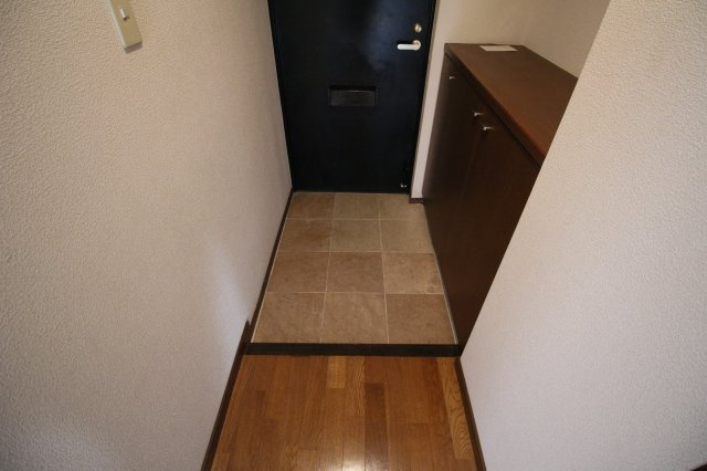 宗像市赤間駅前２丁目の賃貸マンションの玄関