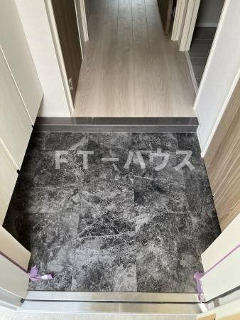 ジュウセイ　レジデンスの玄関