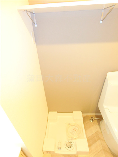CASA PIAZZAカーサピアッツァ下丸子の設備|棚付きの洗濯機置き場