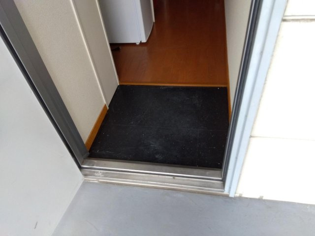 神戸市西区前開南町２丁目の賃貸マンションの玄関