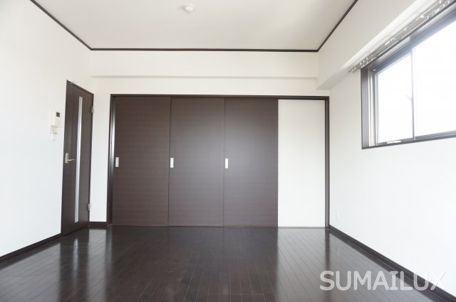 熊本市中央区南熊本１丁目の賃貸マンションの寝室