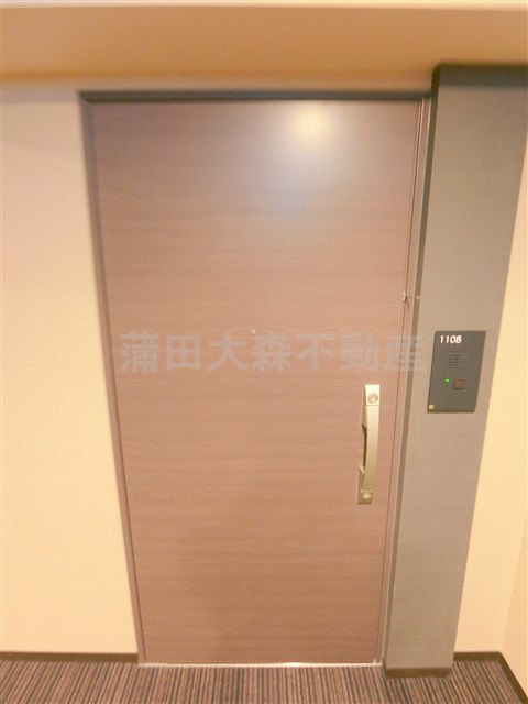 コンフォリア蒲田の玄関