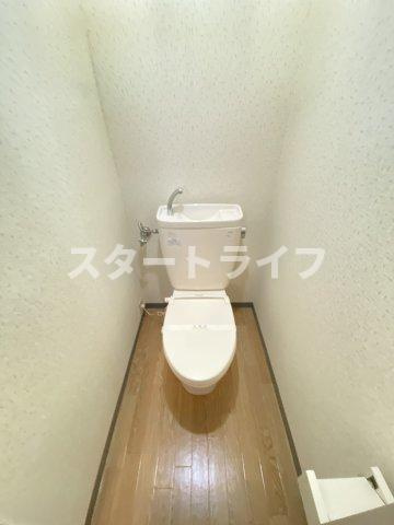 大阪市淀川区十三東１丁目の賃貸マンションのトイレ