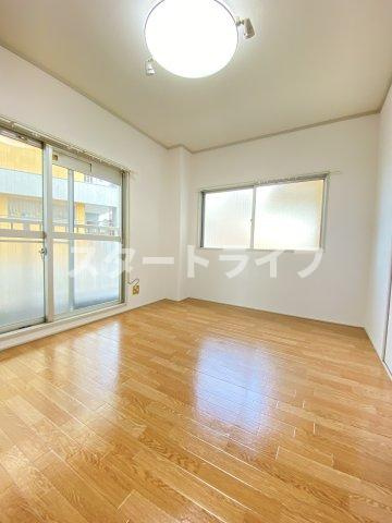 大阪市淀川区十三東１丁目の賃貸マンションの寝室