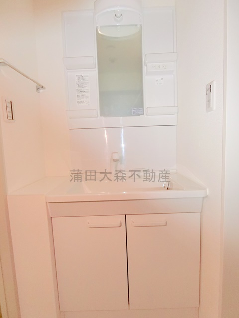 パインコート梅屋敷の洗面所