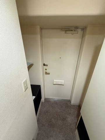 アルファ大供の玄関