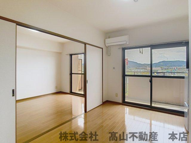 宗像市石丸１丁目の賃貸マンションの居間・リビング