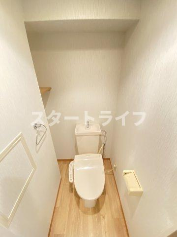 大阪市東淀川区西淡路１丁目の賃貸マンションのトイレ