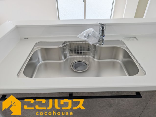 宜野湾市嘉数2丁目　新築戸建て　全8棟　G号棟のキッチン|洗い物のしやすいワイドシンク
