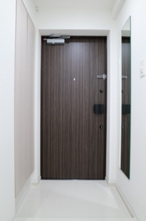 北区王子本町１丁目の賃貸マンションの玄関
