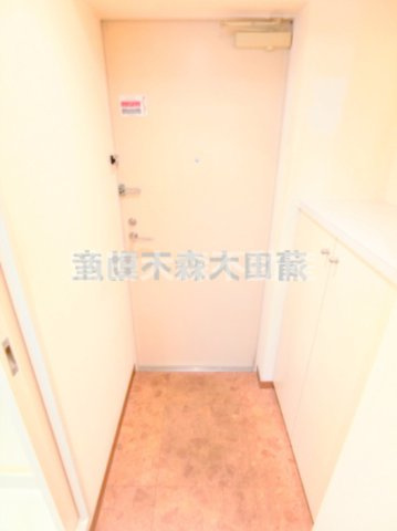 北糀谷コートの玄関