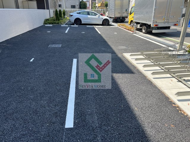エムクアルト新座の駐車場