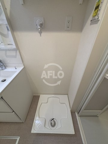 ハーモニーテラス田中　田中小学校の洗面所|ハーモニーテラス田中　洗濯機置き場