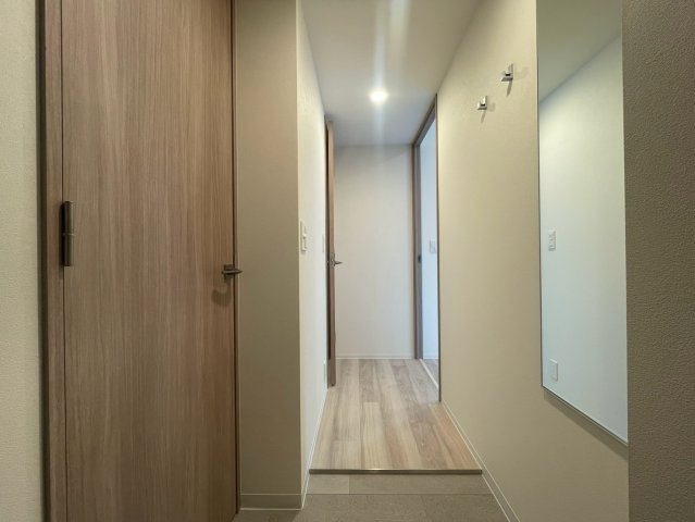 コンフォリア・リヴ本町WEST　Qの玄関