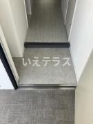 レユシール塚本の玄関