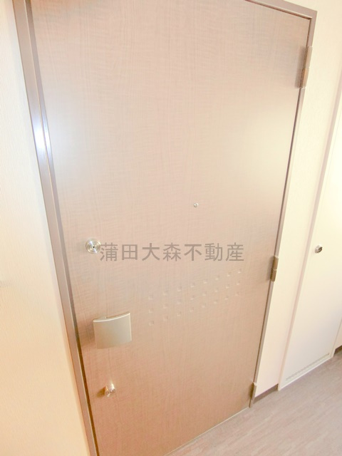 ブライズ多摩川の玄関