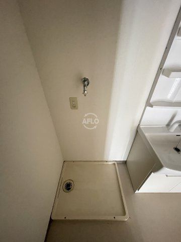 ドエル北堀江　堀江小学校の設備|ドエル北堀江　室内洗濯機置き場