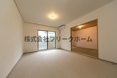 三鷹市井の頭５丁目の賃貸マンションの居間・リビング