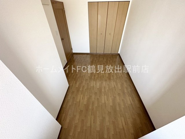 大阪市鶴見区鶴見３丁目の賃貸マンションの洋室