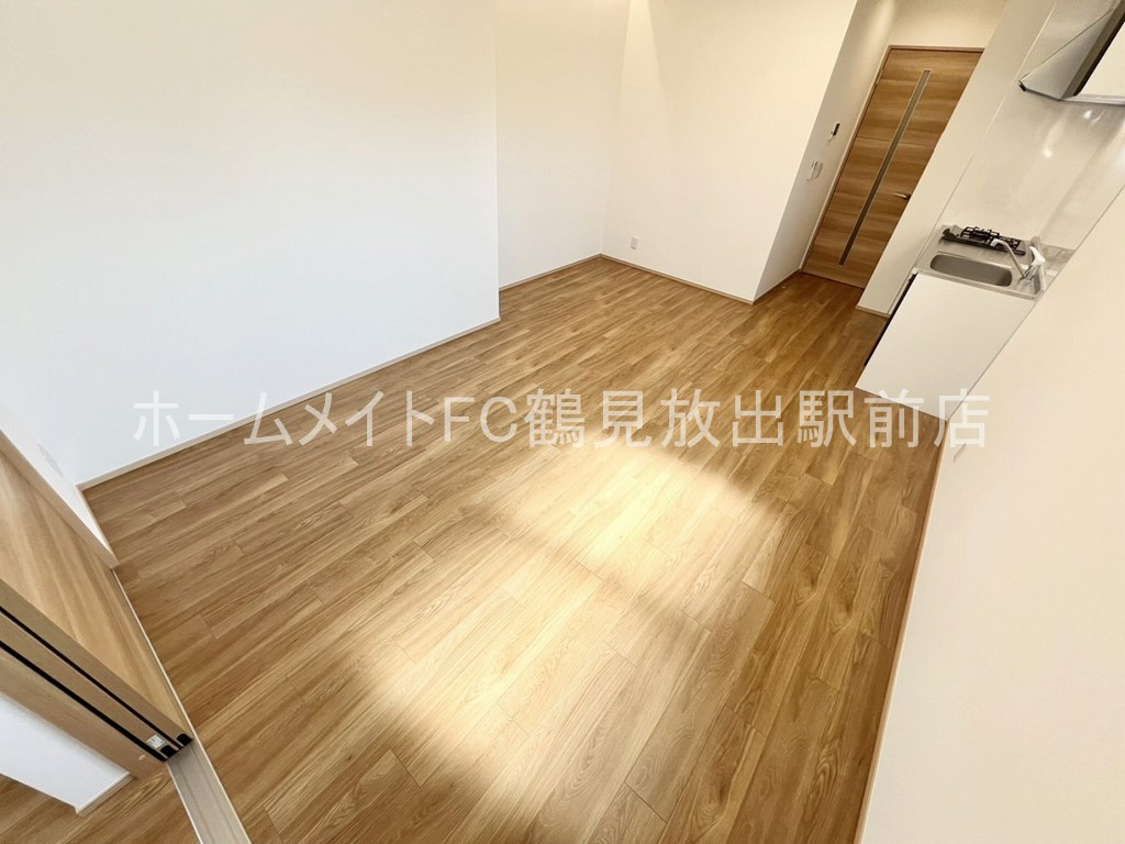 大阪市鶴見区放出東２丁目のアパートの居間・リビング