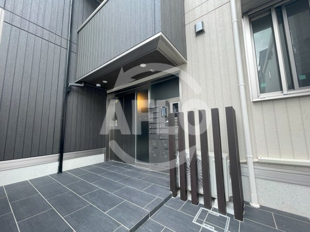 カーサルミノサ王子町　阿倍野小学校区のエントランス