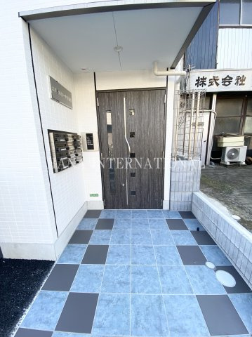 エクセルカーサ平和台のエントランス