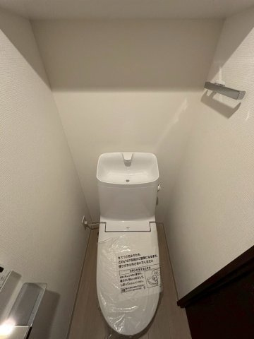 調布市上石原１丁目の賃貸マンションのトイレ