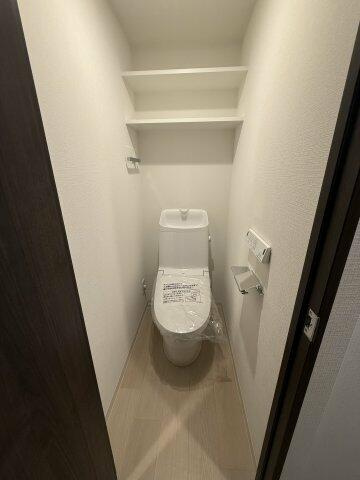 調布市上石原１丁目の賃貸マンションのトイレ