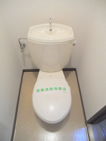 サンライズ平成Ｂのトイレ|落ち着いた色合いのトイレ