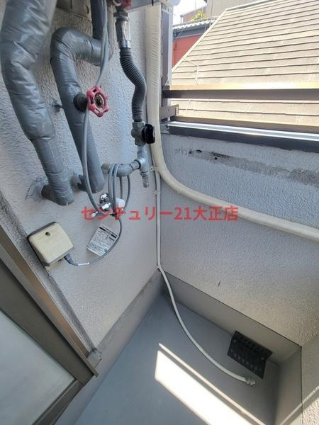 ポートワンの洗面所|バルコニーに洗濯機置場