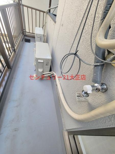 ポートワンの洗面所|バルコニーに洗濯機置場