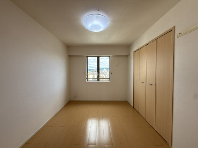 玲巧ハイツ八丁の寝室